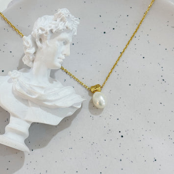 Hanging pearl necklace