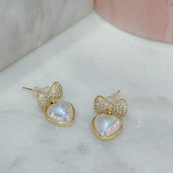 Diamond bow with hanging heart earrings