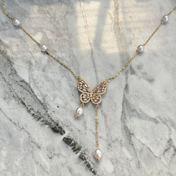 Pink butterfly necklace