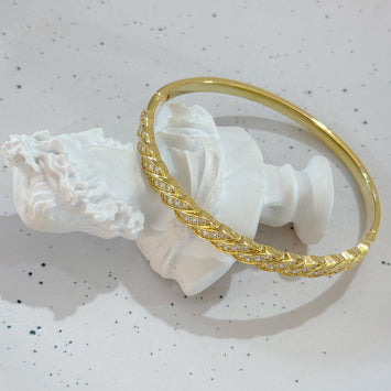 Golden twisted bangle