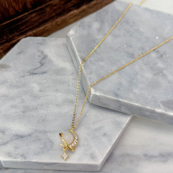 Gold planet necklace