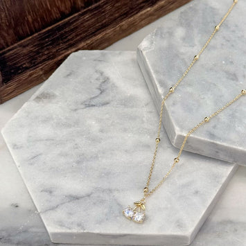 Gold cherry necklace