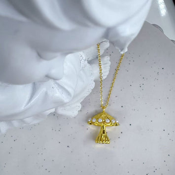 Gold mushroom necklace