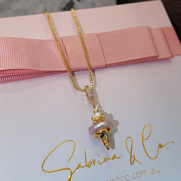 Hanging pink pearl necklace