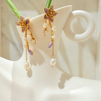 Flower with hanging pearl earrings