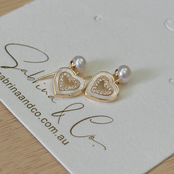 Pearl with hanging shell heart earrings