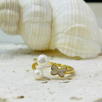 Shell butterfly with double pearl ring