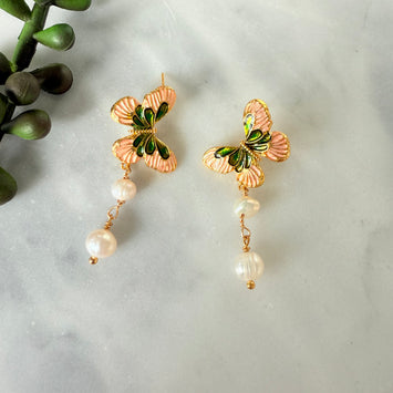 Pink butterfly with hanging pearl earrings