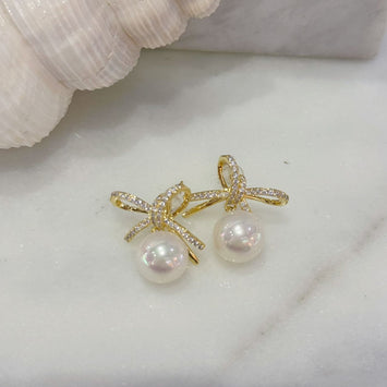 Bow and pearl earrings