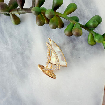 Shell sailboat brooch