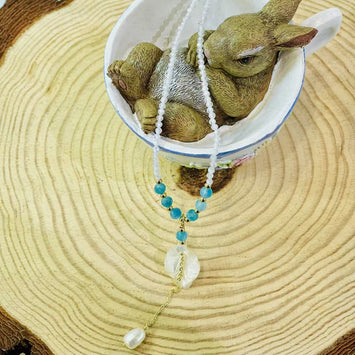 Gemstone necklace with hanging pearl