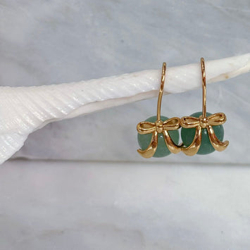 Hanging green bow earrings