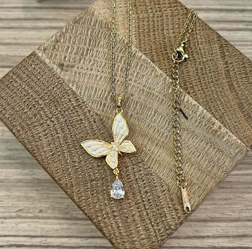 Pearl butterfly with hanging diamond necklace