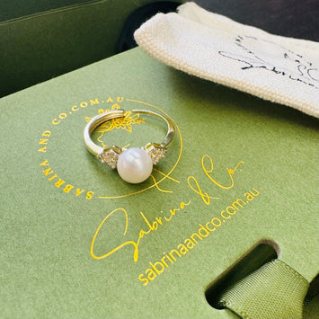 Double diamond with pearl ring