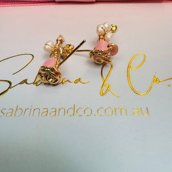 Rose with pearl earrings