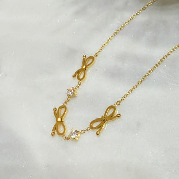 Triple bow necklace