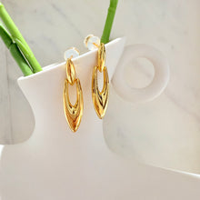 Carved hanging drop earrings