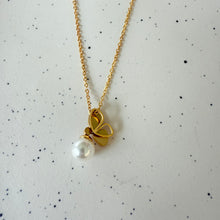 Pink wing necklace