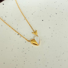 Half shell heart necklace