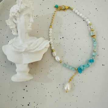 Aquamarine with hanging pearl bracelet