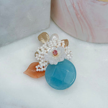 Shell flower brooch