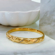 Golden twist bangle