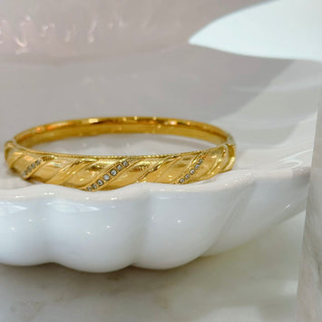 Golden twist bangle