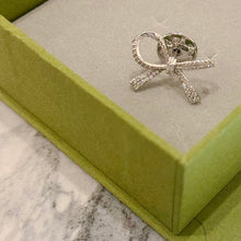 Sliver bow brooch