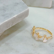 Quadruple shell butterfly ring