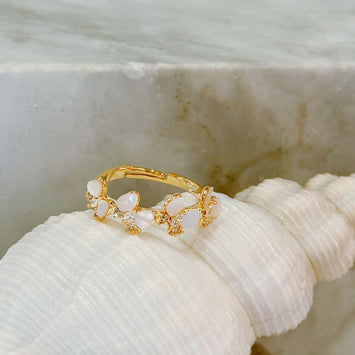 Quadruple shell butterfly ring