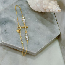 Diamond cross bracelet