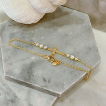 Diamond cross bracelet