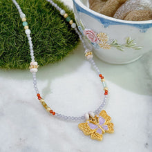 Purple butterfly necklace