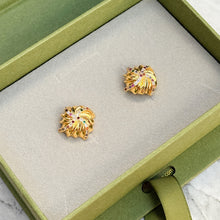 Golden designed square earrings