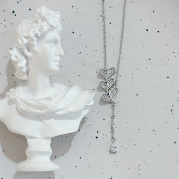 Triple leaf with hanging diamond necklace