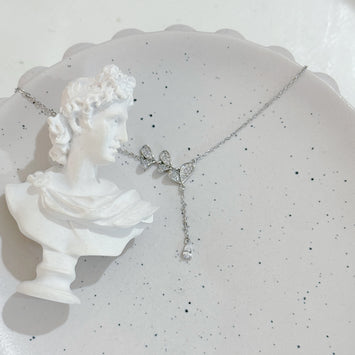 Triple leaf with hanging diamond necklace