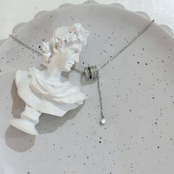 Triple loop with hanging diamond necklace