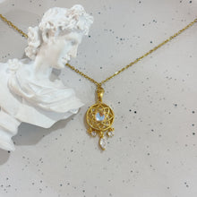 Gold star necklace