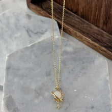 Gold planet necklace