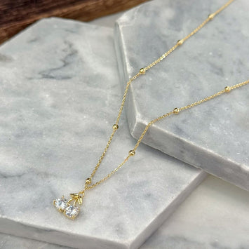 Gold cherry necklace