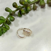 Carved hoop earrings