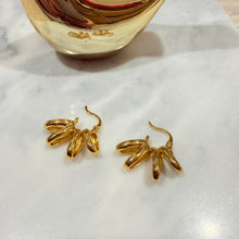 Skirt hoop earrings