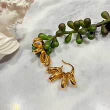 Skirt hoop earrings
