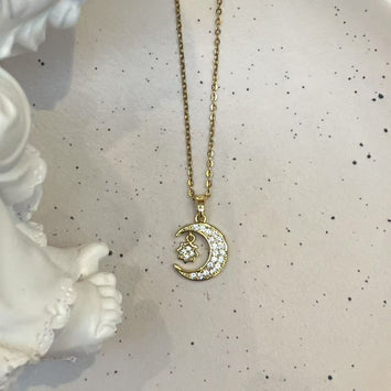 Hanging moon and star necklace