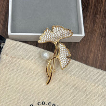 Golden leaf brooch