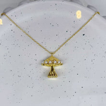 Gold mushroom necklace