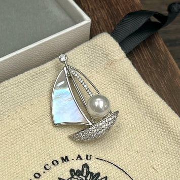 Sliver boat brooch