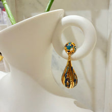 Hanging designed drop earrings