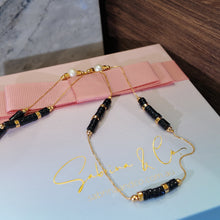 Pearl and gemstone necklace