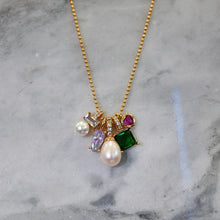 Hanging pearl and gemstone necklace